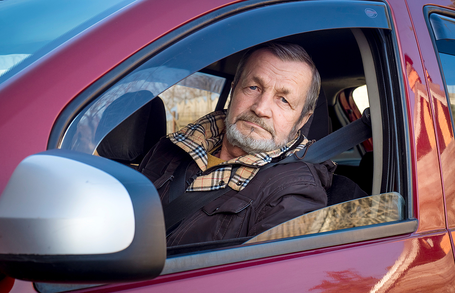 An elderly man getting driver medicals assessment