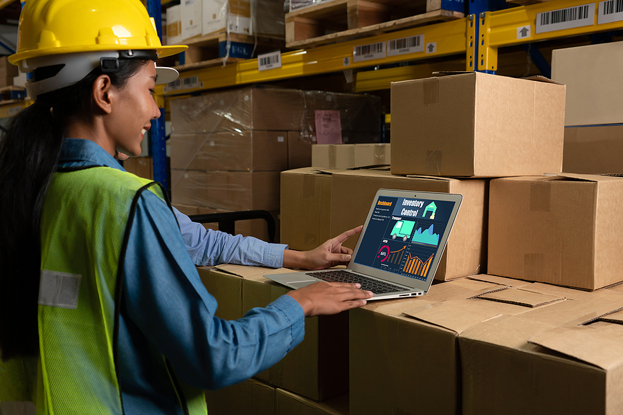 Woman working in the inventory using myob advanced software